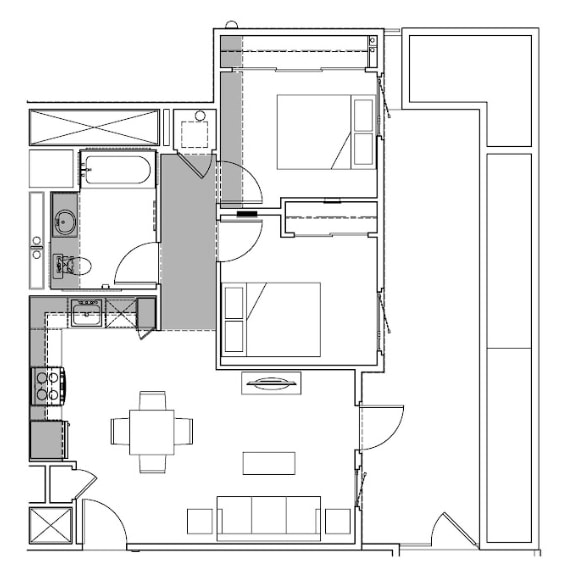 A floor plan of a house with a kitchen, living room, and bathroom.