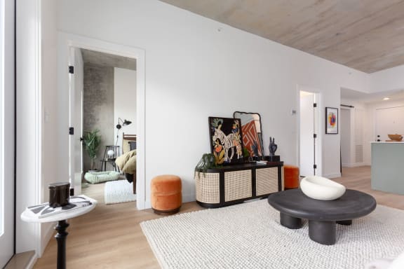 a living room with a couch and a table