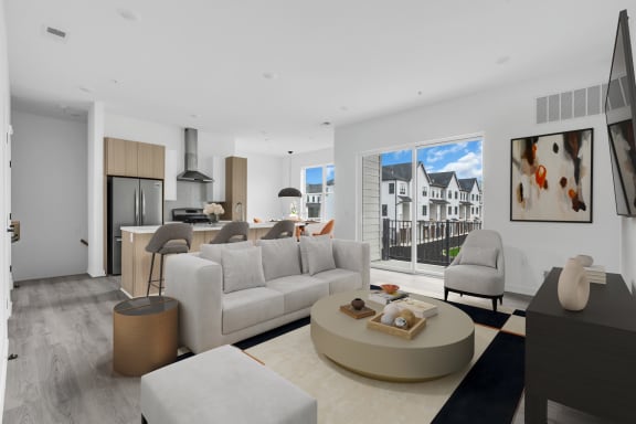 a living room with a white couch and a table