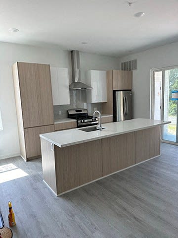 a kitchen with a sink and a counter top at The Franklin Marlboro Apartments, Marlboro, NJ 07746
