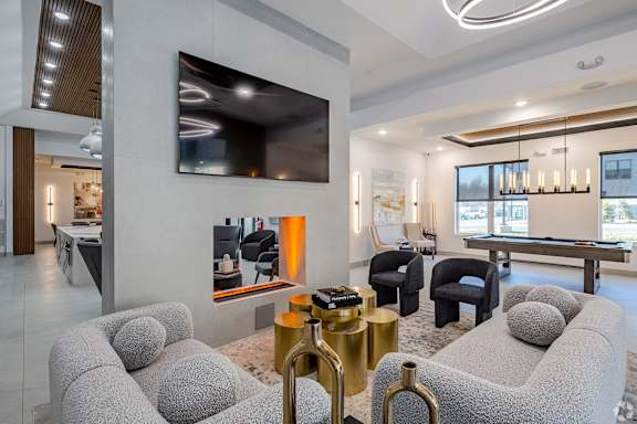 Living room with fireplace at The Franklin at Tenafly, Tenafly