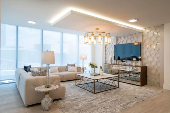 a living room with a couch and a table