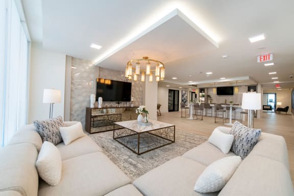 a living room with a couch and a table