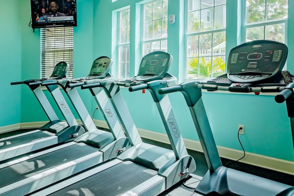 Treadmills in the fitness center at Cypress Cove Apartments