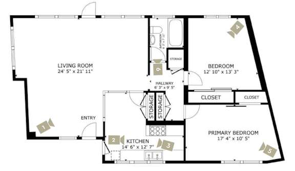 A floor plan of a home with a living room, two bedrooms, a kitchen, and a storage area.