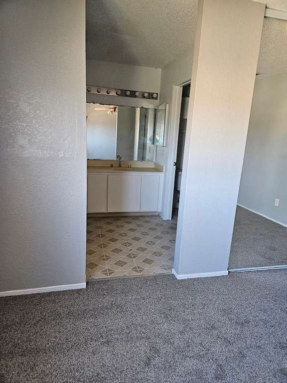 a view of a kitchen from the living room