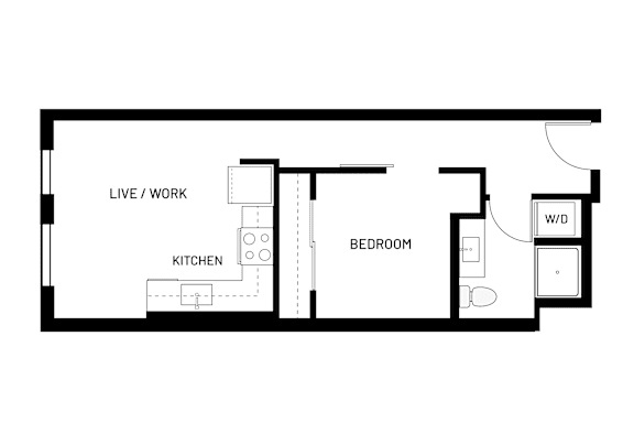 A floor plan of a small apartment with a living/work area, kitchen, and bedroom.