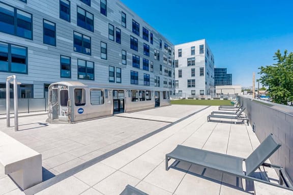 a building with benches in front of a building
