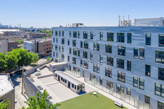 an aerial view of a large building in a city