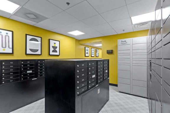 a room with a bunch of filing cabinets and a yellow wall