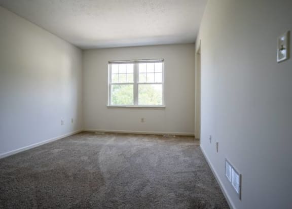 View of typical bedroom with carpet