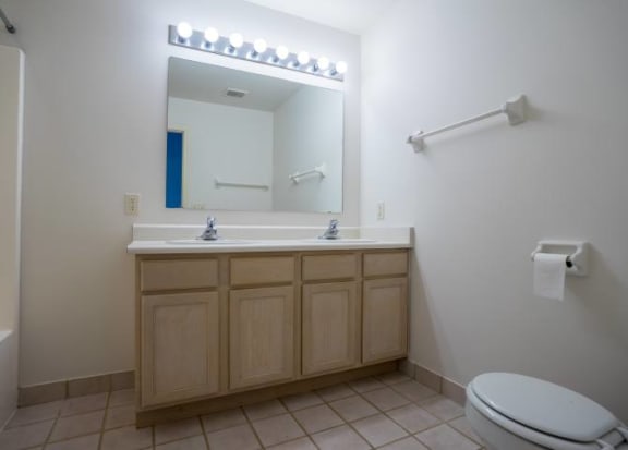 Full bathroom with double sink