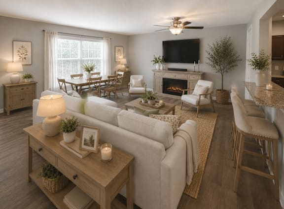 A living room with a fireplace and a television.