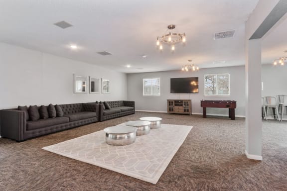the preserve at ballantyne commons community room with couches and tables