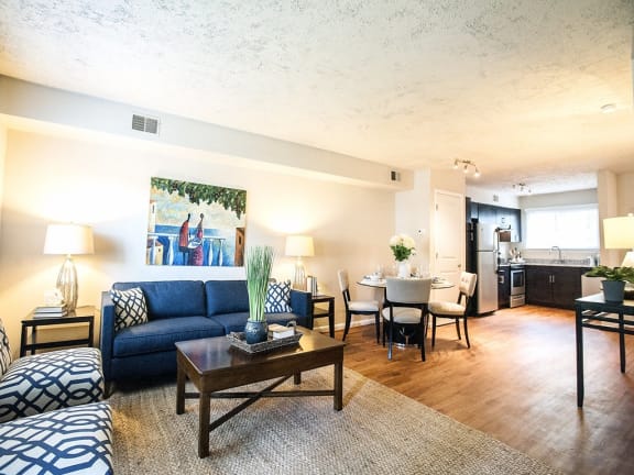 a living room with a couch and a coffee table at Parkside at Five Points, Raleigh