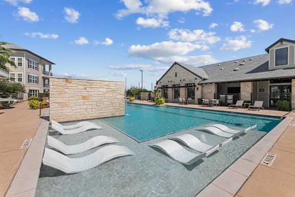Pool with a Stone Wall at Citadel at Westpointe Apartments, San Antonio, TX, 78245