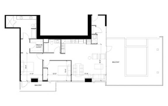 A black and white floor plan of a house with a balcony and a walk-in closet.
