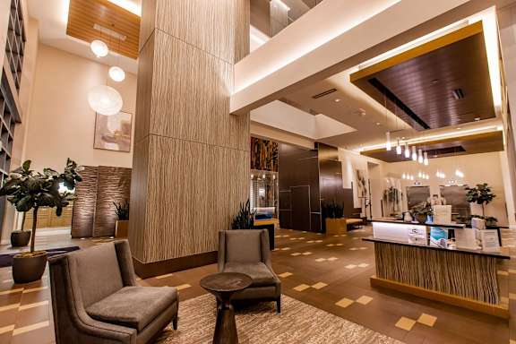 A reception area with a brown and beige color scheme.
