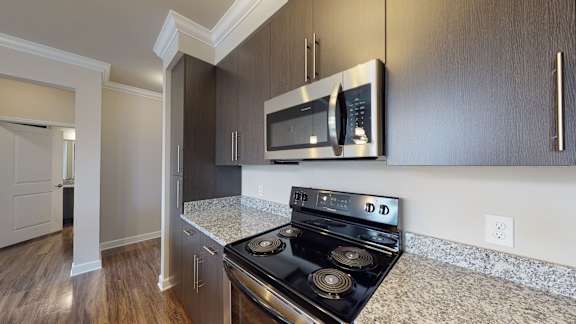 Granite countertops and stainless steel appliances
