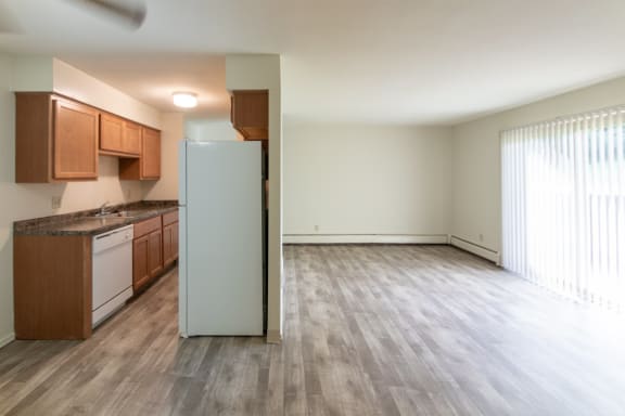 kitchen and living room in the 722 square foot 2 bedroom apartment  at Aspen Village, Cincinnati, OH