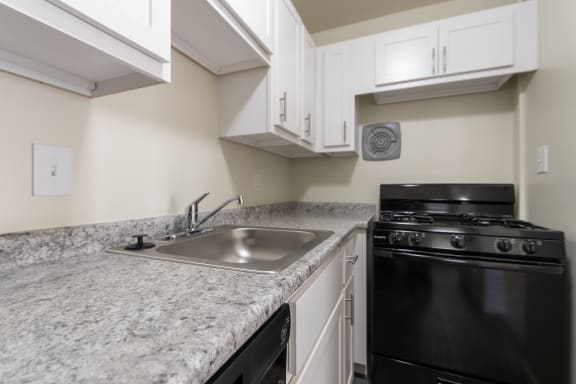 This is a photo of the kitchen in the 543 square foot B-style, 1 bedroom, 1 bath apartment at Blue Grass Manor Apartments in Erlanger, KY.