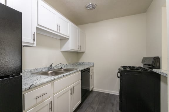 This is a photo of the kitchen in the 543 square foot A-style, 1 bedroom, 1 bath apartment at Blue Grass Manor Apartments in Erlanger, KY.