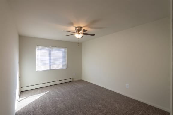 This is a photo of the bedroom in the 543 square foot A-style, 1 bedroom, 1 bath apartment at Blue Grass Manor Apartments in Erlanger, KY.