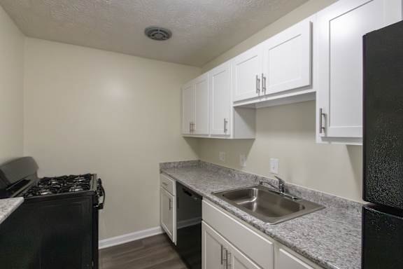 This is a photo of the kitchen in the 543 square foot A-style, 1 bedroom, 1 bath apartment at Blue Grass Manor Apartments in Erlanger, KY.