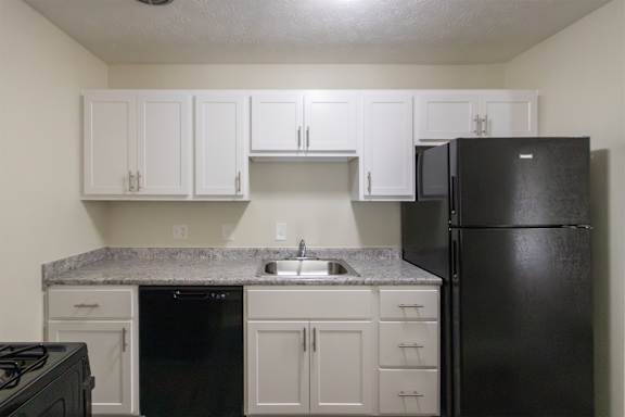 This is a photo of the kitchen in the 543 square foot A-style, 1 bedroom, 1 bath apartment at Blue Grass Manor Apartments in Erlanger, KY.