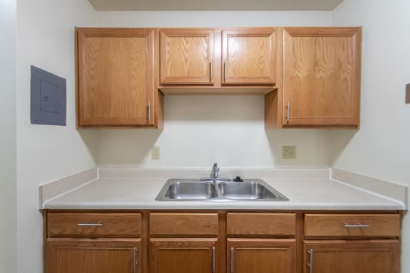 This is a photo of the kitchen in the 705 square foot, 1 bedroom, 1 bath apartment at Blue Grass Manor Apartments in Erlanger, KY.