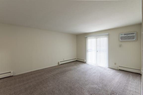 This is a photo of the living room in the 705 square foot, 1 bedroom, 1 bath apartment at Blue Grass Manor Apartments in Erlanger, KY.