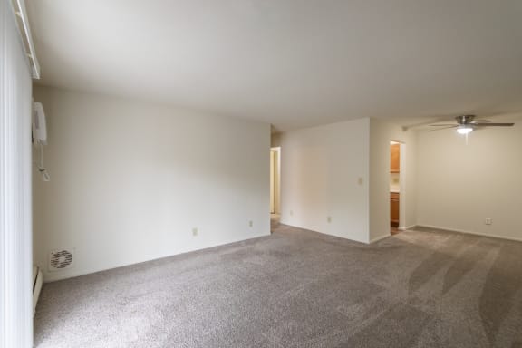 This is a photo of the living room in the 705 square foot, 1 bedroom, 1 bath apartment at Blue Grass Manor Apartments in Erlanger, KY.