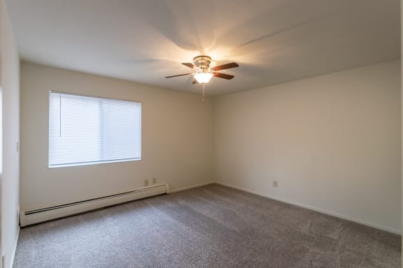 This is a photo of the bedroom in the 705 square foot, 1 bedroom, 1 bath apartment at Blue Grass Manor Apartments in Erlanger, KY.