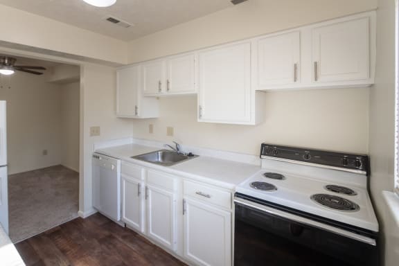 This is a photo of the kitchen in the 899 square foot, 2 bedroom, 1.5 bath apartment at Blue Grass Manor Apartments in Erlanger, KY.