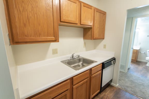 This is a photo of the kitchen in the 652 square foot, 1 bedroom, 1 bath A-style apartment at Blue Grass Manor Apartments in Erlanger, KY.