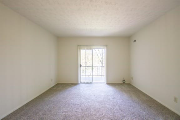 This is a photo of the living room in the 652 square foot, 1 bedroom, 1 bath A-style apartment at Blue Grass Manor Apartments in Erlanger, KY.