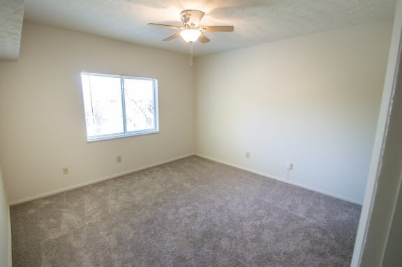 This is a photo of the bedroom in the 652 square foot, 1 bedroom, 1 bath A-style apartment at Blue Grass Manor Apartments in Erlanger, KY.