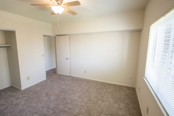 This is a photo of the bedroom in the 652 square foot, 1 bedroom, 1 bath A-style apartment at Blue Grass Manor Apartments in Erlanger, KY.