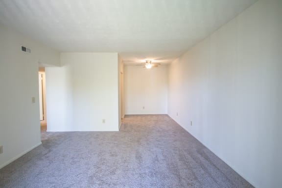 This is a photo of the living room in the 652 square foot, 1 bedroom, 1 bath A-style apartment at Blue Grass Manor Apartments in Erlanger, KY.