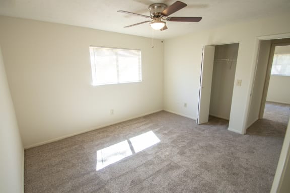 This is a photo of the master bedroom in the 899 square foot, 2 bedroom, 1 and a half bath apartment at Blue Grass Manor Apartments in Erlanger, KY.