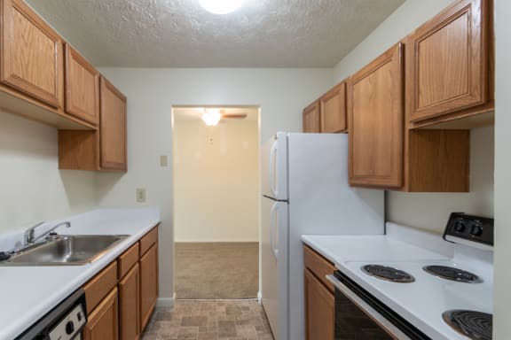 This is a photo of the kitchen in the 652 square foot, 1 bedroom, 1 bath B-style apartment at Blue Grass Manor Apartments in Erlanger, KY.