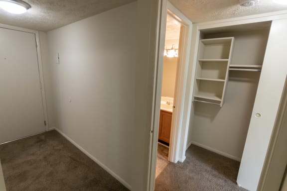 This is a photo of the entryway and hallway closet in the 652 square foot, 1 bedroom, 1 bath B-style apartment at Blue Grass Manor Apartments in Erlanger, KY.