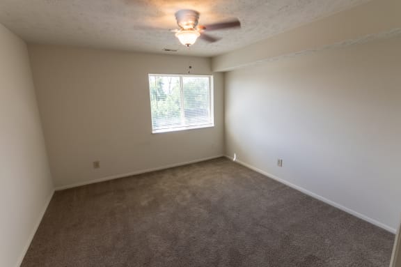 This is a photo of the bedroom in the 652 square foot, 1 bedroom, 1 bath B-style apartment at Blue Grass Manor Apartments in Erlanger, KY.