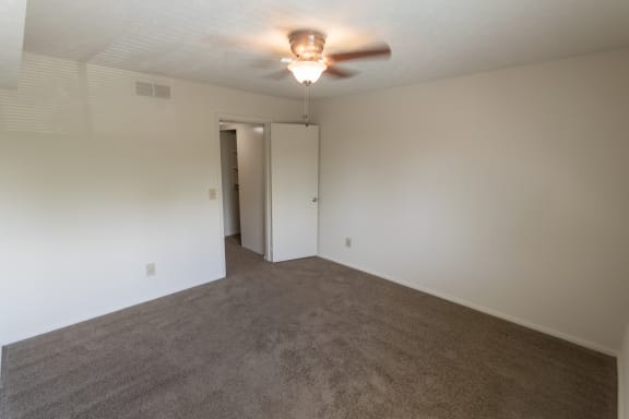 This is a photo of the bedroom in the 652 square foot, 1 bedroom, 1 bath B-style apartment at Blue Grass Manor Apartments in Erlanger, KY.