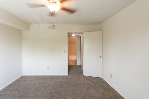 This is a photo of the bedroom in the 652 square foot, 1 bedroom, 1 bath B-style apartment at Blue Grass Manor Apartments in Erlanger, KY.