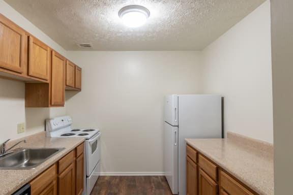 This is a photo of the kitchen in the 938 square foot , 2 bedroom, 2 bath apartment at Blue Grass Manor Apartments in Erlanger, KY
