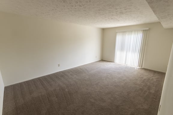 This is a photo of the living room in the 938 square foot , 2 bedroom, 2 bath apartment at Blue Grass Manor Apartments in Erlanger, KY