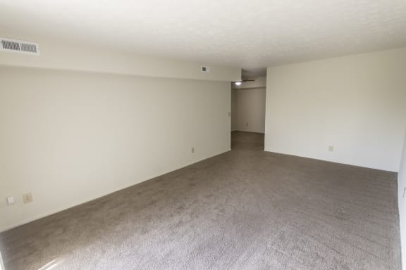This is a photo of the living room in the 938 square foot , 2 bedroom, 2 bath apartment at Blue Grass Manor Apartments in Erlanger, KY