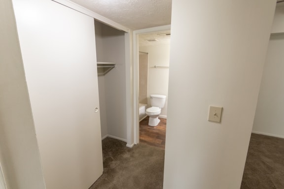 This is a photo of the hallway looking towards the bathroom in the 938 square foot , 2 bedroom, 2 bath apartment at Blue Grass Manor Apartments in Erlanger, KY
