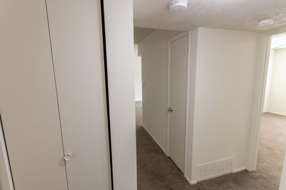 This is a photo of the hallway in the 938 square foot , 2 bedroom, 2 bath apartment at Blue Grass Manor Apartments in Erlanger, KY